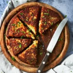 photo of frico from Friuli made from Montasio cheese and potatoes in a rustic setting