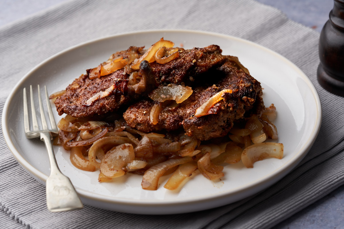 image of fegato in agrodolce a sicilian style veal liver cooked in a sweet and sour sauce and servced with sweet and sour onions