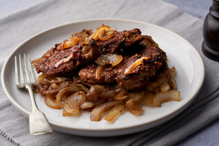 image of fegato in agrodolce a sicilian style veal liver cooked in a sweet and sour sauce and servced with sweet and sour onions