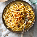 image of pasta con broccoli arrimata with toasted breadcrumbs on top