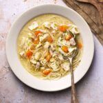 warm Hungarian Chicken Noodle Soup served in a rustic style