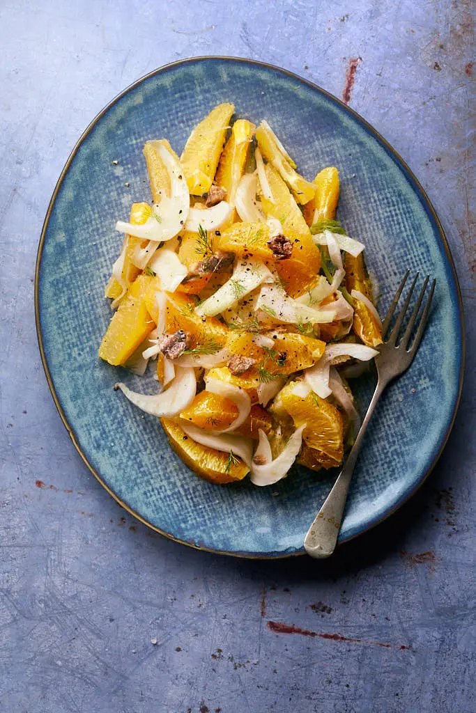 Photo of sicilian orange and fennel salad in a summer setting