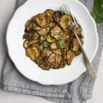 rustic image of zucchini a scapece, fried zucchini in a vinegar and mint marinade