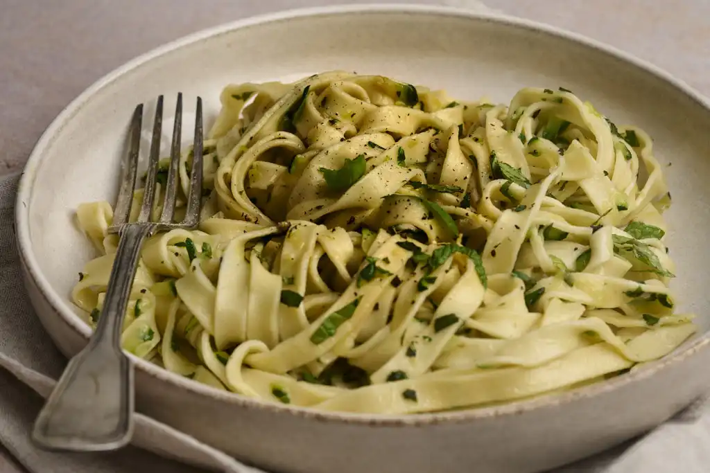 image of tagliatelle with zucchini mint and basil