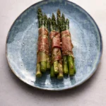 image of prosciutto wrapped asparagus, a delicious Italian spring recipe