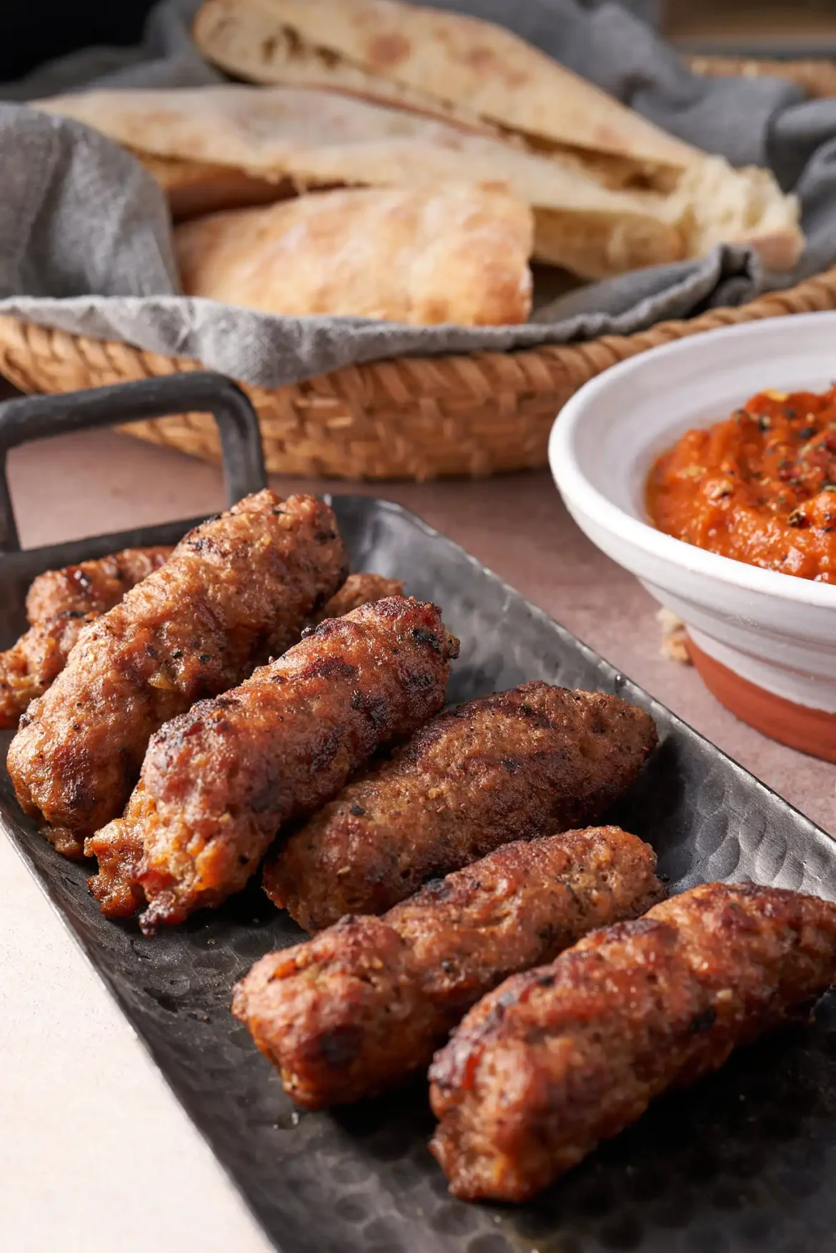 Cevapcici – Friuli’s Balkan Grilled Sausage Cevapcici - Balkan grilled sausages served with ajvar