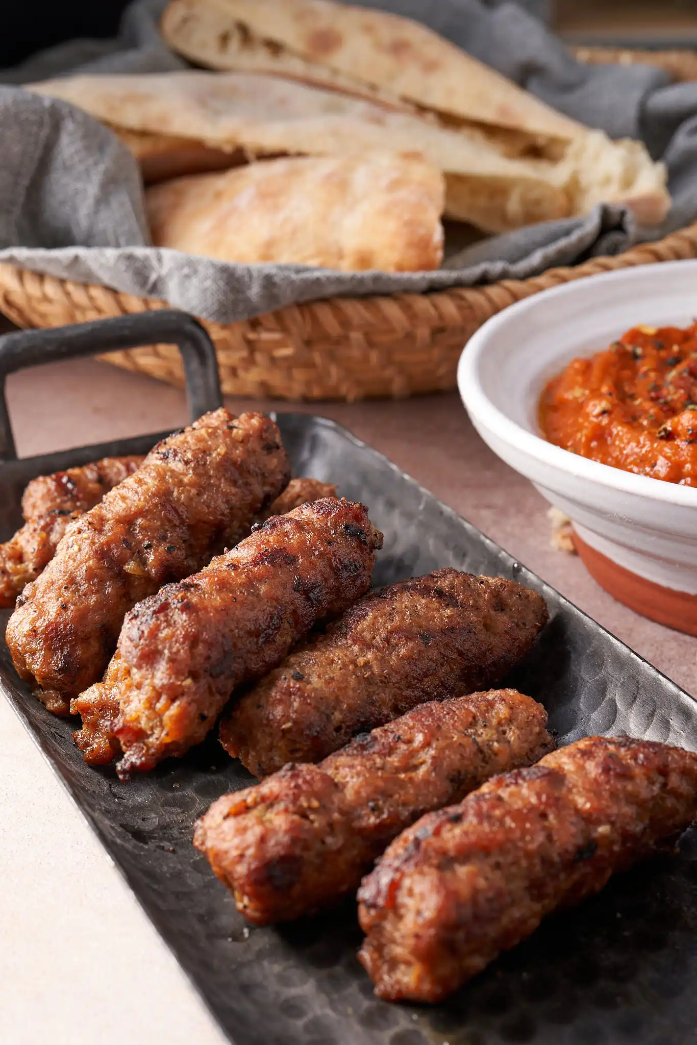 Cevapcici - Balkan grilled sausages served with ajvar