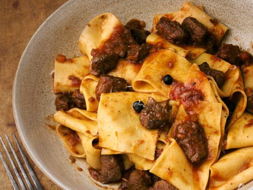 image of Tuscan Wild Boar Ragu in a rustic setting