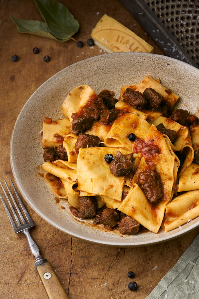 image of Tuscan Wild Boar Ragu in a rustic setting