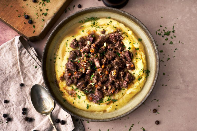 Image of Friuli wild boar ragu marinaded in white wine and juniper berries, served with soft creamy polenta