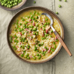 image of delicious bowl of Risi e Bisi which is a spring italian dish of rice and peas that is somewhere between a soup and a risotto